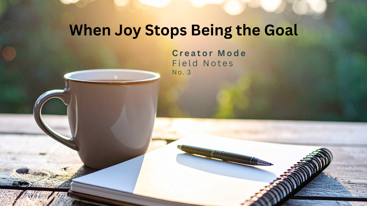 A journal and coffee mug resting on a wooden table at sunrise, symbolizing quiet reflection, presence, and the practice of returning to oneself.